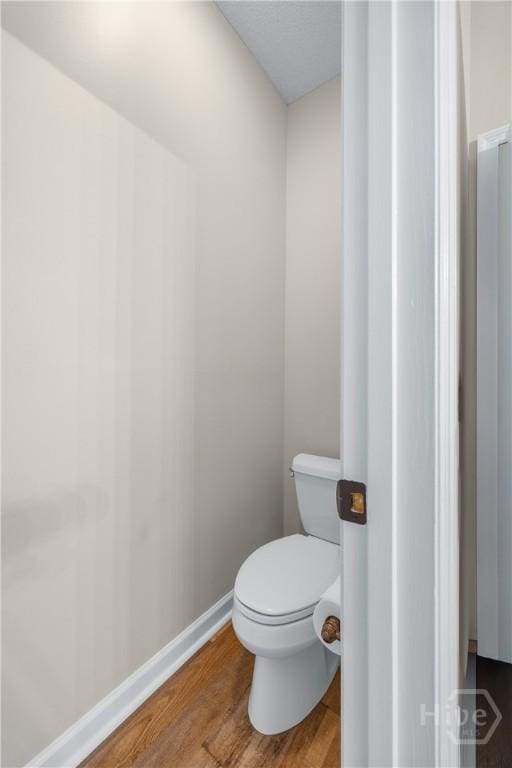 139 Mingarry Dr, Richmond Hill, GA 31324 - bathroom featuring wood finished floors and toilet