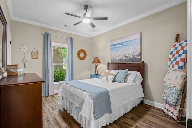 139 Mingarry Dr, Richmond Hill, GA 31324 - bedroom with wood finished floors, ornamental molding, and a ceiling fan