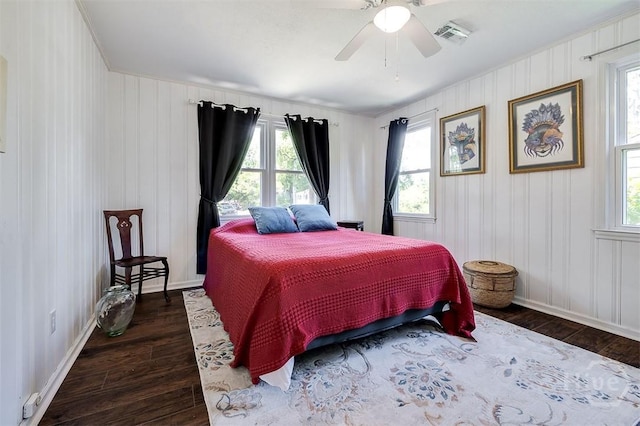 2338 Lorraine Dr, Savannah, GA 31404 - bedroom featuring dark wood finished floors, multiple windows, and ceiling fan