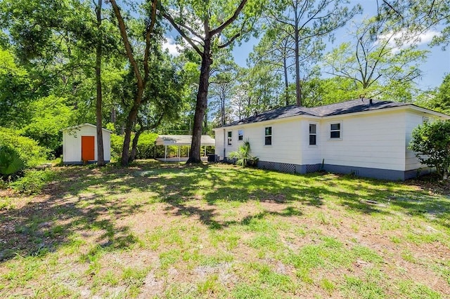 2338 Lorraine Dr, Savannah, GA 31404 - view of grassy yard with a shed