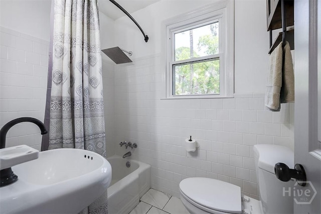 2338 Lorraine Dr, Savannah, GA 31404 - bathroom with tile walls and shower / bath combination with curtain