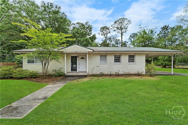 129 Vandiver Rd, Walthourville, GA 31301 - view of front of house featuring a carport and a metal roof
