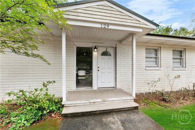 129 Vandiver Rd, Walthourville, GA 31301 - doorway to property with brick siding