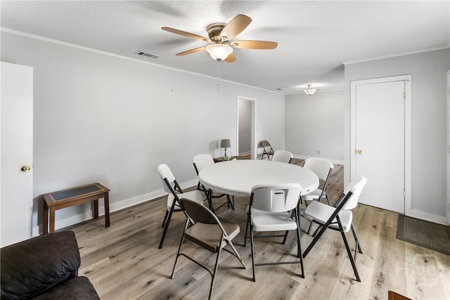 129 Vandiver Rd, Walthourville, GA 31301 - dining area with crown molding, light wood-style floors, and a ceiling fan