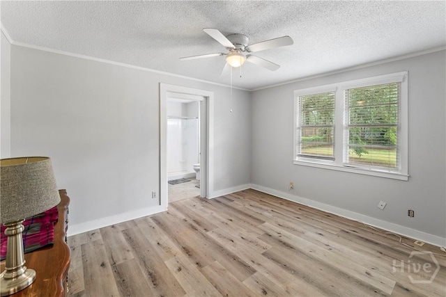 129 Vandiver Rd, Walthourville, GA 31301 - empty room featuring ceiling fan, a textured ceiling, light wood-style floors, and ornamental molding