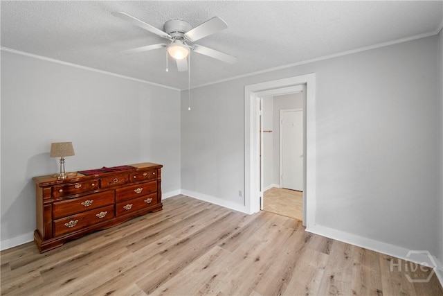 129 Vandiver Rd, Walthourville, GA 31301 - spare room with light wood finished floors, ceiling fan, ornamental molding, and a textured ceiling