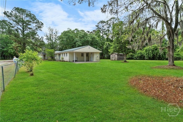 129 Vandiver Rd, Walthourville, GA 31301 - view of yard featuring a storage shed