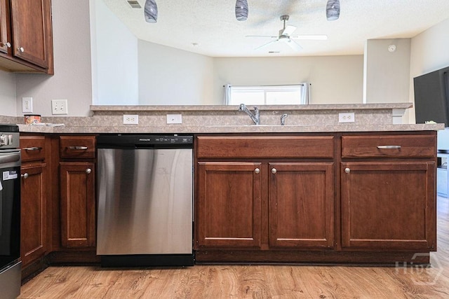 1125 Canyon Oak Loop, Richmond Hill, GA 31324 - kitchen featuring stainless steel dishwasher, a ceiling fan, light wood-style flooring, and light countertops
