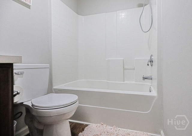 1125 Canyon Oak Loop, Richmond Hill, GA 31324 - bathroom featuring shower / bathtub combination, wood finished floors, and vanity