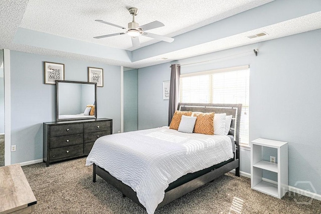 1125 Canyon Oak Loop, Richmond Hill, GA 31324 - carpeted bedroom with a textured ceiling and a ceiling fan