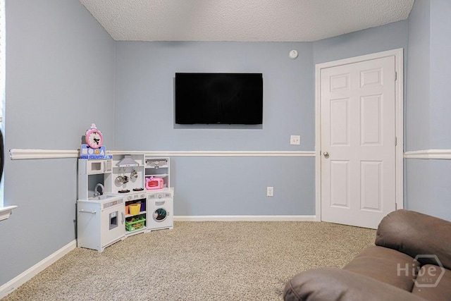 1125 Canyon Oak Loop, Richmond Hill, GA 31324 - playroom featuring carpet and a textured ceiling