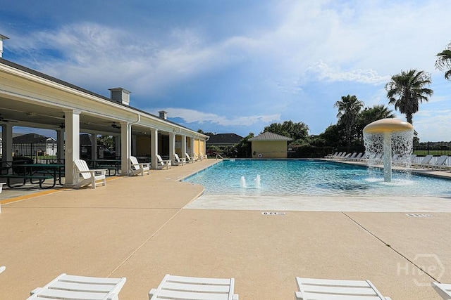 1125 Canyon Oak Loop, Richmond Hill, GA 31324 - community pool featuring a patio and a ceiling fan