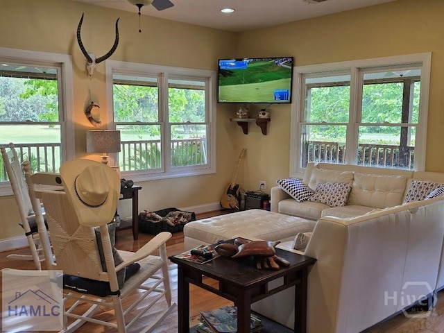 485 Lake Pamona Rd, Midway, GA 31320 - living area with healthy amount of natural light and wood finished floors