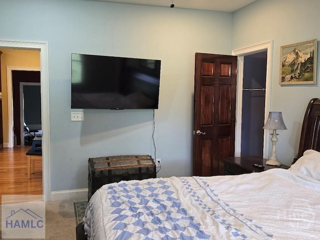 485 Lake Pamona Rd, Midway, GA 31320 - carpeted bedroom featuring baseboards