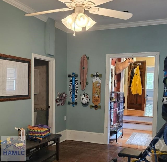 485 Lake Pamona Rd, Midway, GA 31320 - foyer entrance with ornamental molding, ceiling fan, and wood finished floors