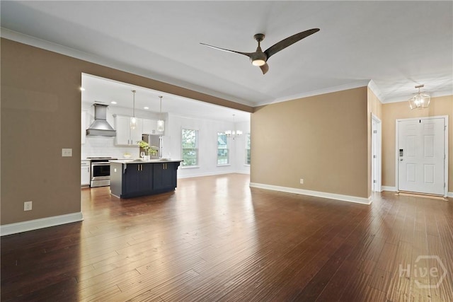 95 Simcoe Lake Dr, Richmond Hill, GA 31324 - unfurnished living room with a chandelier, ceiling fan, dark wood-type flooring, and crown molding