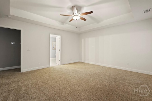 95 Simcoe Lake Dr, Richmond Hill, GA 31324 - carpeted spare room featuring a tray ceiling and ceiling fan