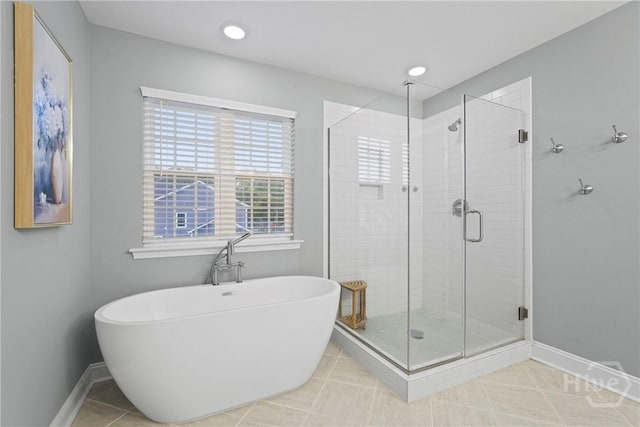 95 Simcoe Lake Dr, Richmond Hill, GA 31324 - bathroom with a freestanding bath, a stall shower, and recessed lighting