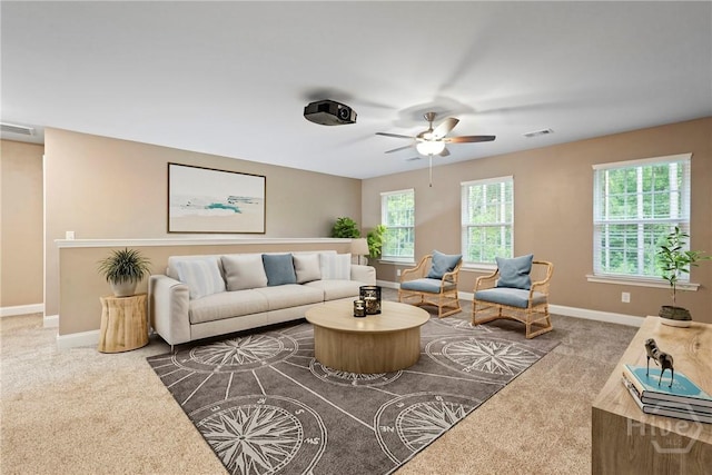 95 Simcoe Lake Dr, Richmond Hill, GA 31324 - living area with carpet floors, plenty of natural light, and ceiling fan