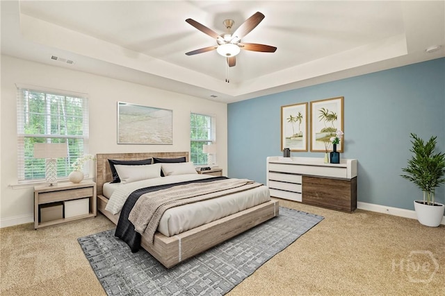 95 Simcoe Lake Dr, Richmond Hill, GA 31324 - carpeted bedroom featuring a tray ceiling and a ceiling fan