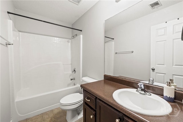 226 Cyane Ln, Guyton, GA 31312 - bathroom featuring vanity, tub / shower combination, a textured ceiling, and tile patterned floors