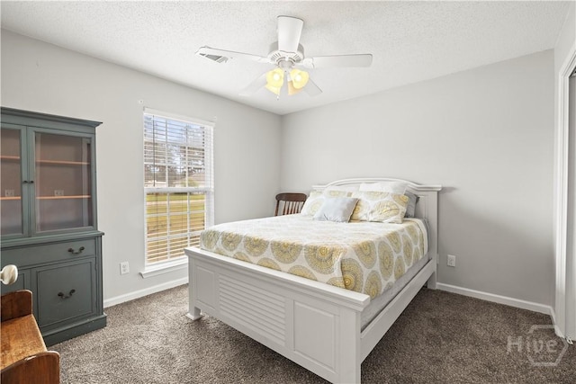 226 Cyane Ln, Guyton, GA 31312 - carpeted bedroom featuring a textured ceiling and ceiling fan
