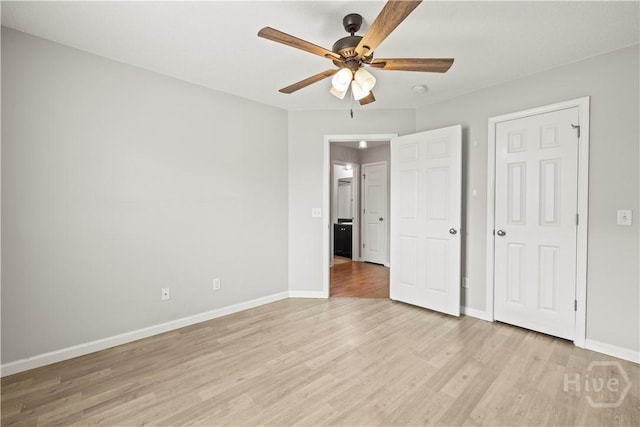 226 Cyane Ln, Guyton, GA 31312 - unfurnished bedroom with light wood finished floors and ceiling fan