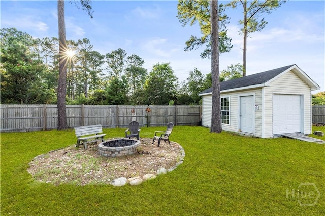 226 Cyane Ln, Guyton, GA 31312 - fenced backyard with an outdoor fire pit and an outdoor structure