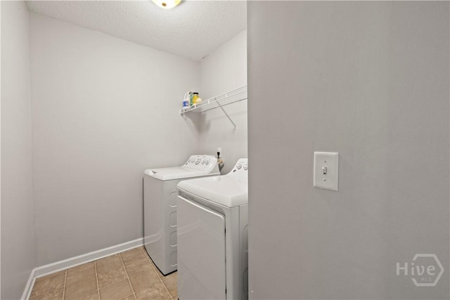 226 Cyane Ln, Guyton, GA 31312 - laundry area featuring independent washer and dryer and a textured ceiling