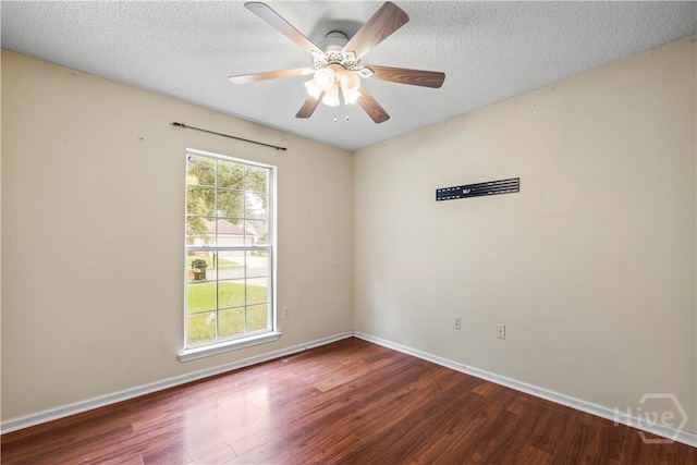 259 Laurel Hill Cir, Richmond Hill, GA 31324 - empty room featuring wood finished floors, a ceiling fan, and a textured ceiling