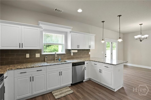 328 Providence Trce, Statesboro, GA 30461 - kitchen featuring dishwasher, dark wood-style floors, a peninsula, decorative backsplash, and white cabinets