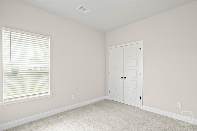 328 Providence Trce, Statesboro, GA 30461 - unfurnished bedroom with carpet flooring and a closet