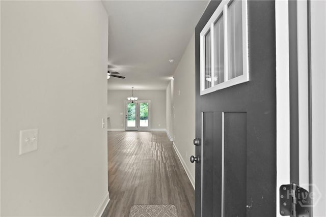 328 Providence Trce, Statesboro, GA 30461 - entrance foyer with dark wood-style flooring, ceiling fan, french doors, and a chandelier
