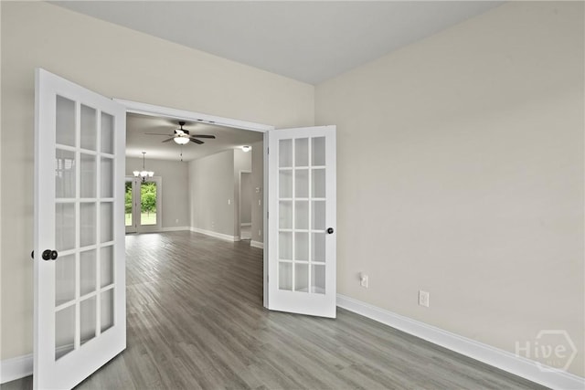 328 Providence Trce, Statesboro, GA 30461 - empty room featuring a chandelier, wood finished floors, and french doors