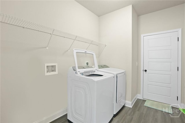 328 Providence Trce, Statesboro, GA 30461 - laundry area featuring dark wood-style floors and washer hookup