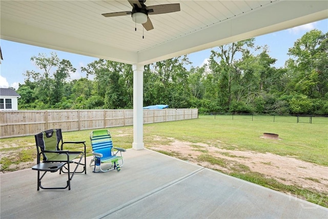 328 Providence Trce, Statesboro, GA 30461 - fenced backyard featuring a patio, ceiling fan, and view of wooded area