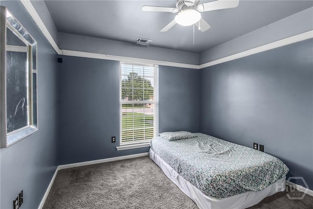 175 Salt Landing Cir, Savannah, GA 31405 - carpeted bedroom with baseboards and a ceiling fan