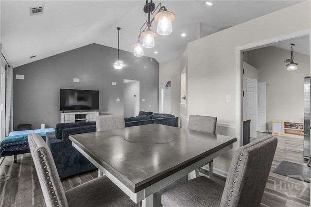 175 Salt Landing Cir, Savannah, GA 31405 - dining area featuring wood finished floors and high vaulted ceiling