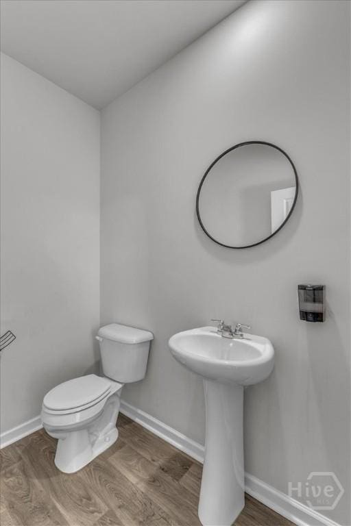 338 Wedge Cir, Richmond Hill, GA 31324 - bathroom featuring wood finished floors