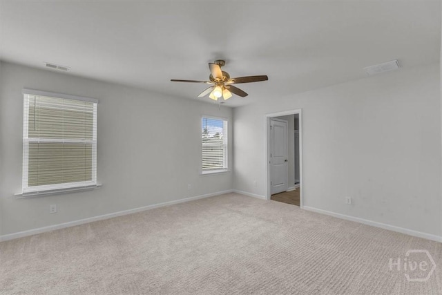338 Wedge Cir, Richmond Hill, GA 31324 - carpeted spare room with baseboards and a ceiling fan