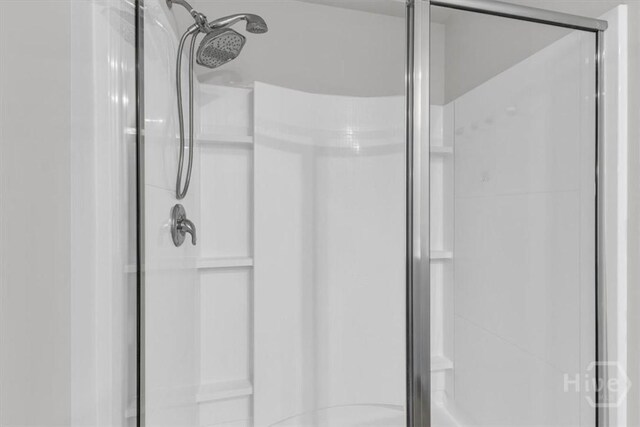 338 Wedge Cir, Richmond Hill, GA 31324 - bathroom with a shower stall