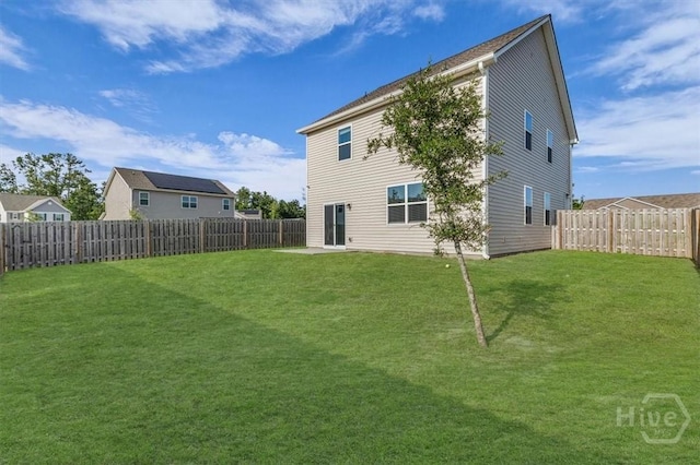 338 Wedge Cir, Richmond Hill, GA 31324 - rear view of property featuring a fenced backyard