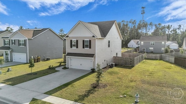 338 Wedge Cir, Richmond Hill, GA 31324 - view of front of property with driveway, a garage, and a residential view