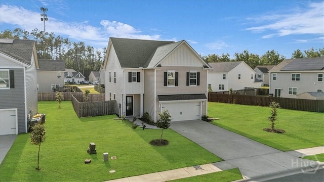 338 Wedge Cir, Richmond Hill, GA 31324 - traditional-style home featuring a residential view, an attached garage, driveway, board and batten siding, and roof with shingles