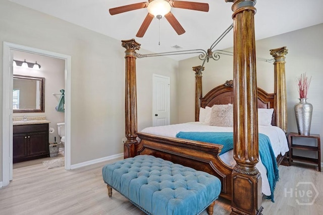 208 Chippingwood Cir, Pooler, GA 31322 - bedroom with light wood finished floors, ensuite bath, and a ceiling fan