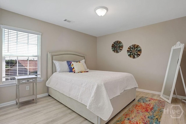 208 Chippingwood Cir, Pooler, GA 31322 - bedroom with light wood-style flooring and baseboards