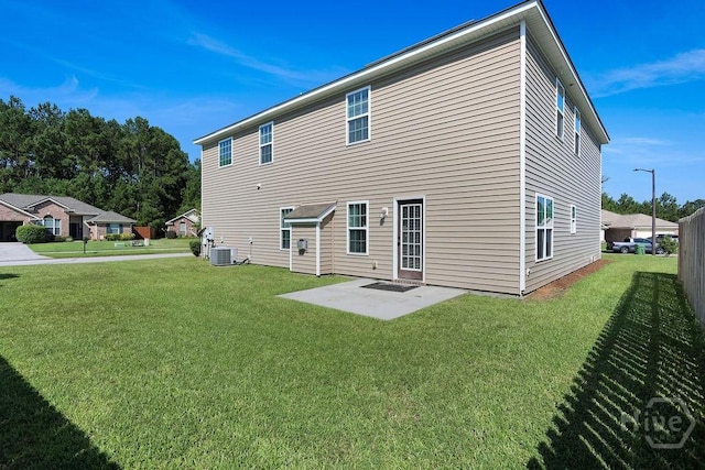 208 Chippingwood Cir, Pooler, GA 31322 - rear view of house featuring a patio and a lawn