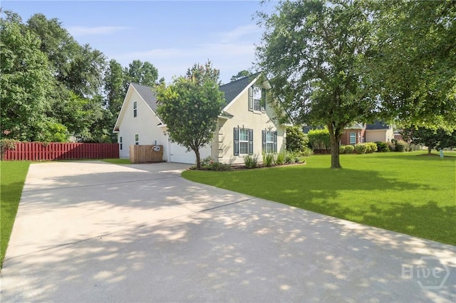 204 Bristol Way, Richmond Hill, GA 31324 - view of front of property with concrete driveway, stucco siding, and an attached garage