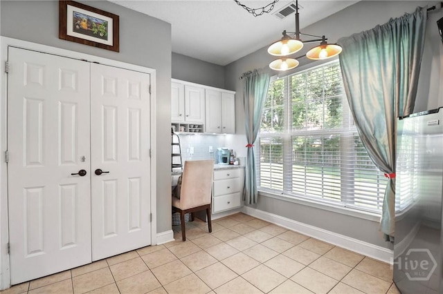204 Bristol Way, Richmond Hill, GA 31324 - home office with plenty of natural light and light tile patterned floors