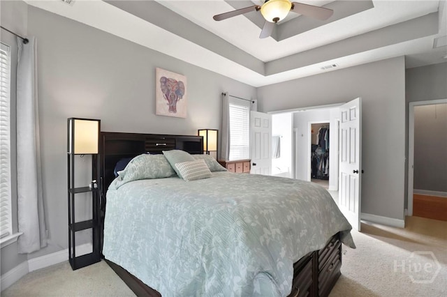 204 Bristol Way, Richmond Hill, GA 31324 - bedroom featuring light colored carpet, a raised ceiling, and ceiling fan